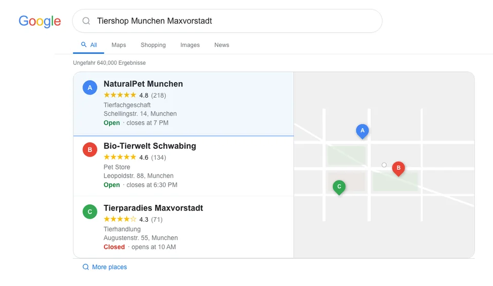 Google local pack for pet store Munich showing three businesses competing in that city independently from Hamburg results, illustrating how each store location ranks in its own geographic market